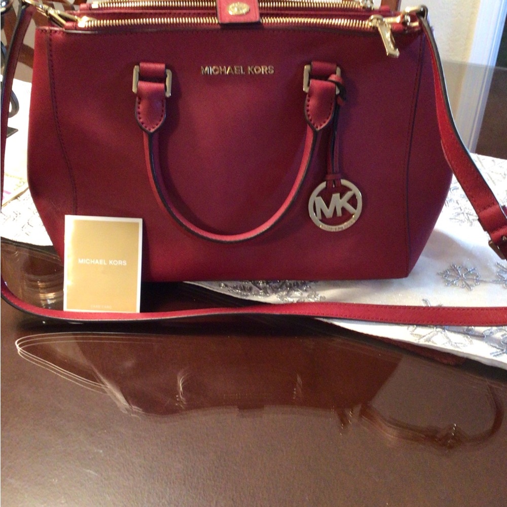 Michael Kors red shoulder bag slightly used